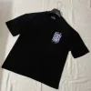 Ottoman-inspired oversize black t-shirt